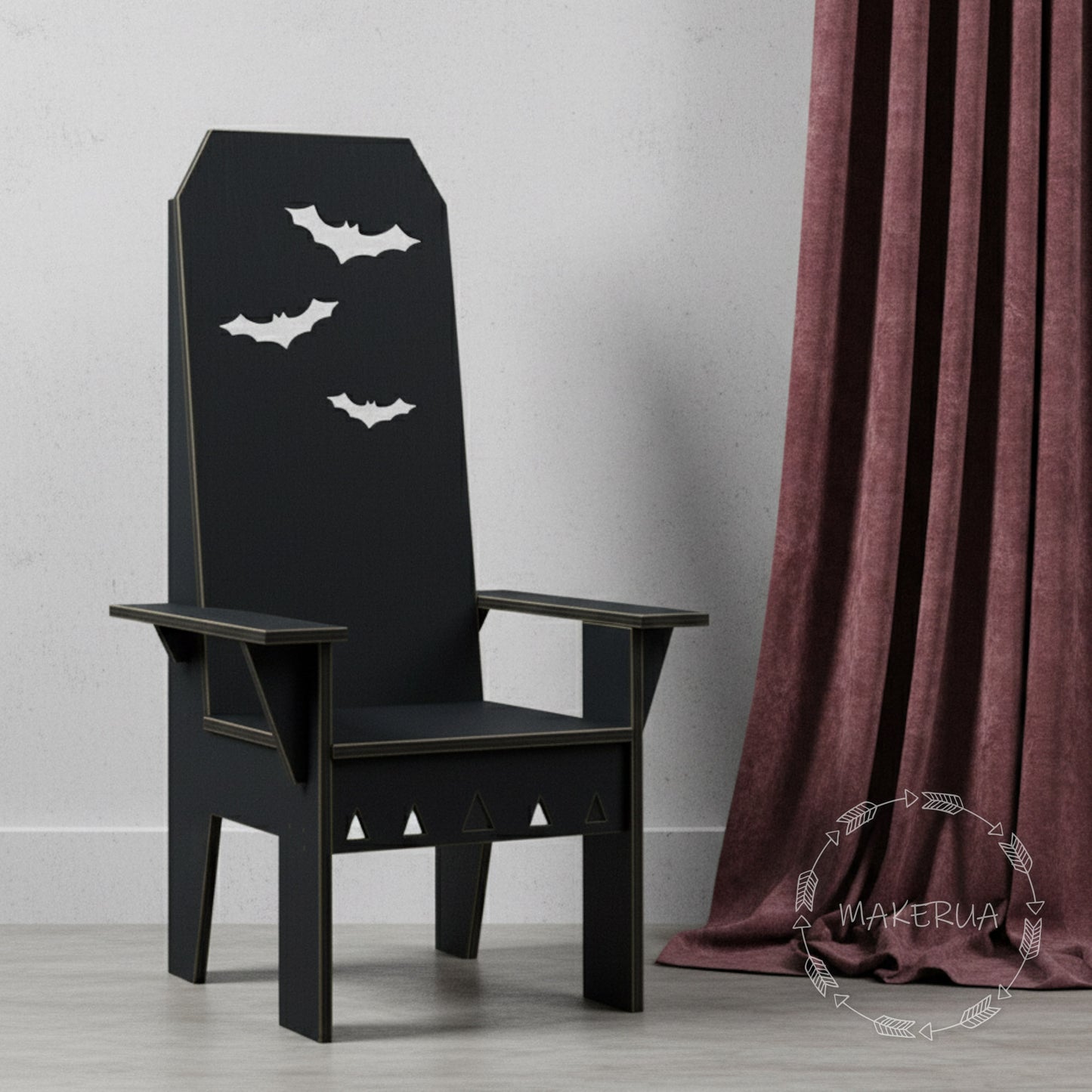 Black tall wooden chair decorated with white bats, perfect spooky photo booth prop for Halloween parties and gothic themed events.