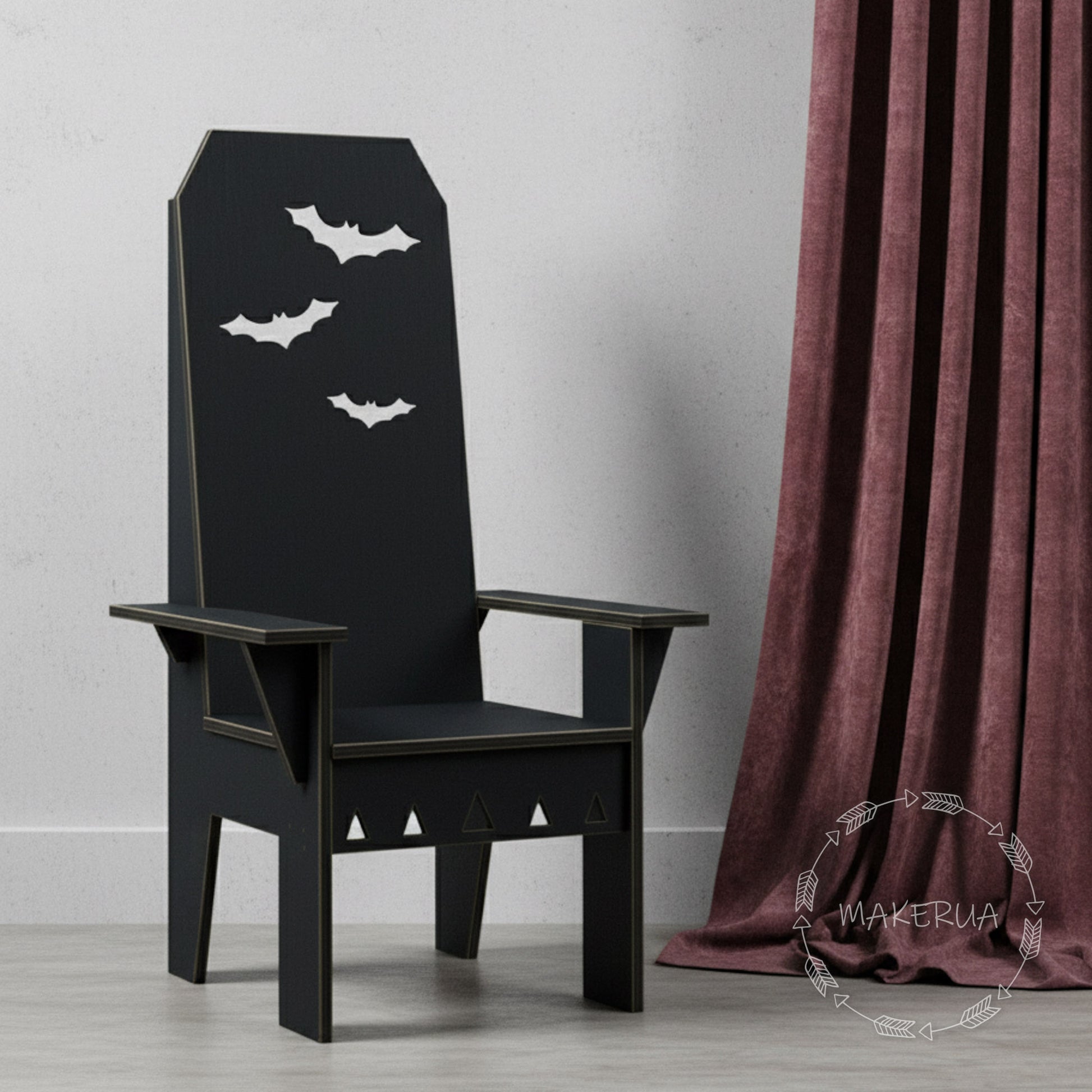 Black tall wooden chair decorated with white bats, perfect spooky photo booth prop for Halloween parties and gothic themed events.