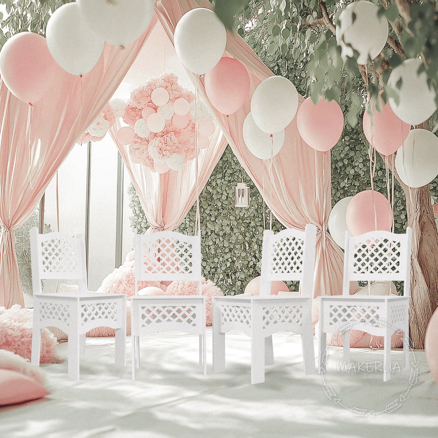 White wooden chairs arranged for a birthday party with decorative elements in the background, including balloons and curtains.