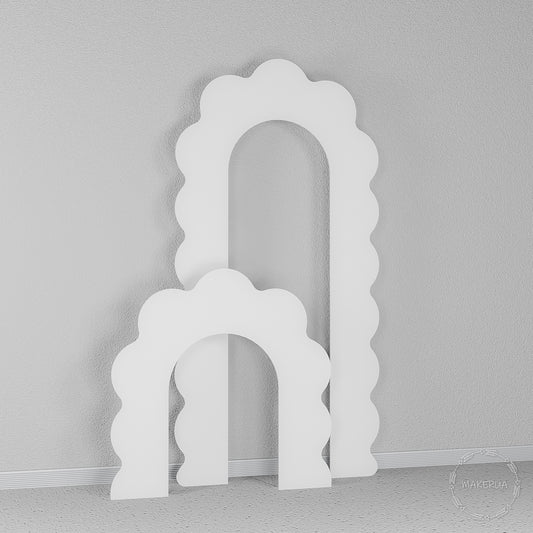 Set of two white wooden open arches with playful wavy scalloped edges. Whimsical frame backdrop perfect for baby showers, kids birthdays, and balloon garland displays.