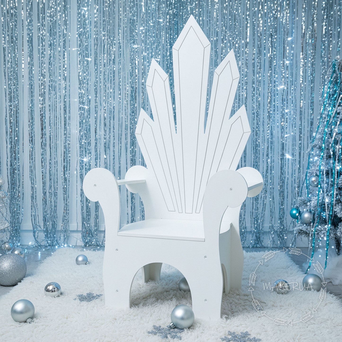 White wooden princess throne chair with ice crystal backrest design, set in a winter wonderland scene with silver decor. Birthday party photo prop.